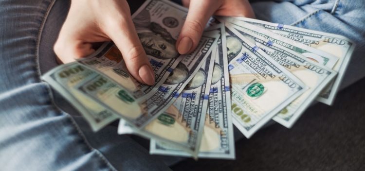 Person holding money